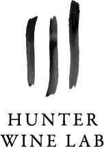 Three vertical stripes being the logo of Hunter Wine Lab